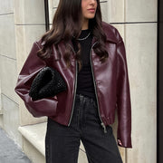 Fashionable women's plain jacket with turn-ups and a front zipper