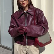 Fashionable women's plain jacket with turn-ups and a front zipper